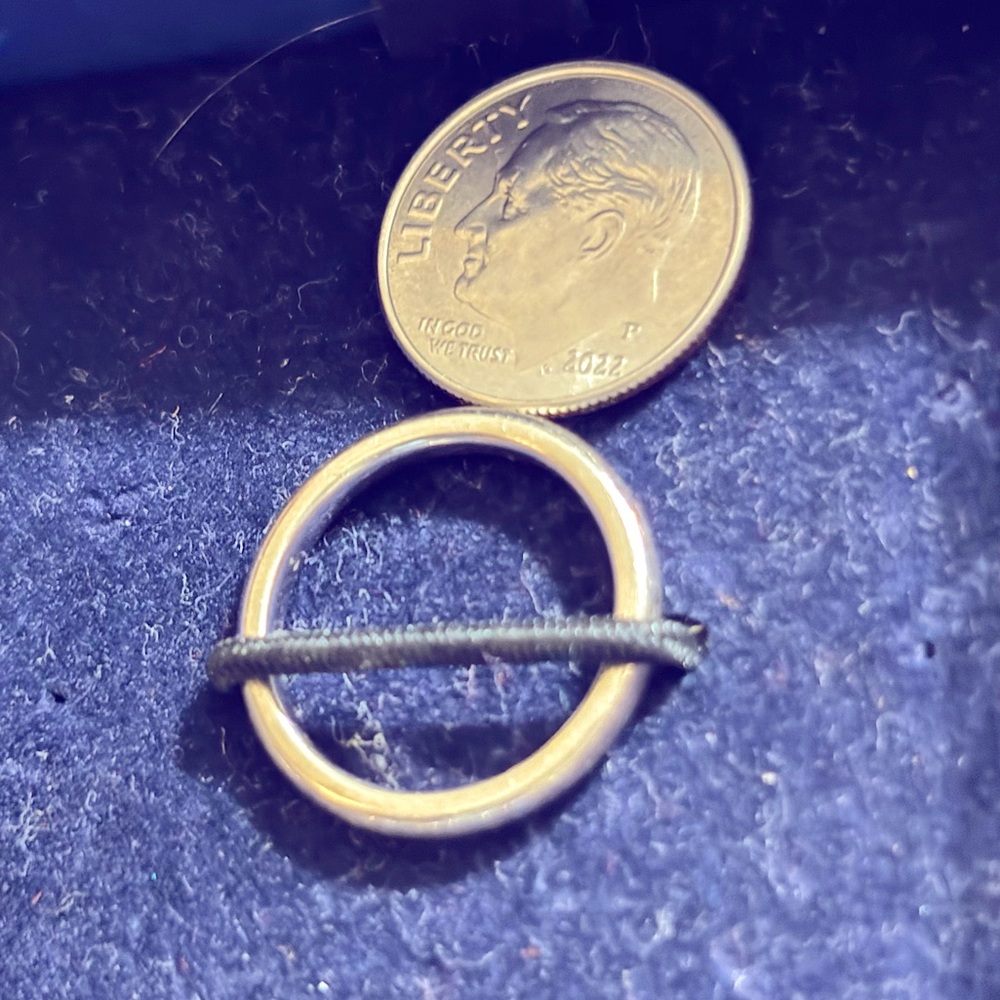 Solid white gold wedding band. Size 6.5